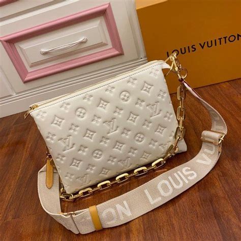 louis vuitton coussin bag cream|louis vuitton nylon bag.